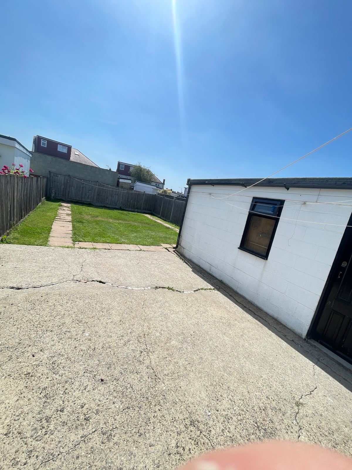 Cleared gravel garden area after waste removal