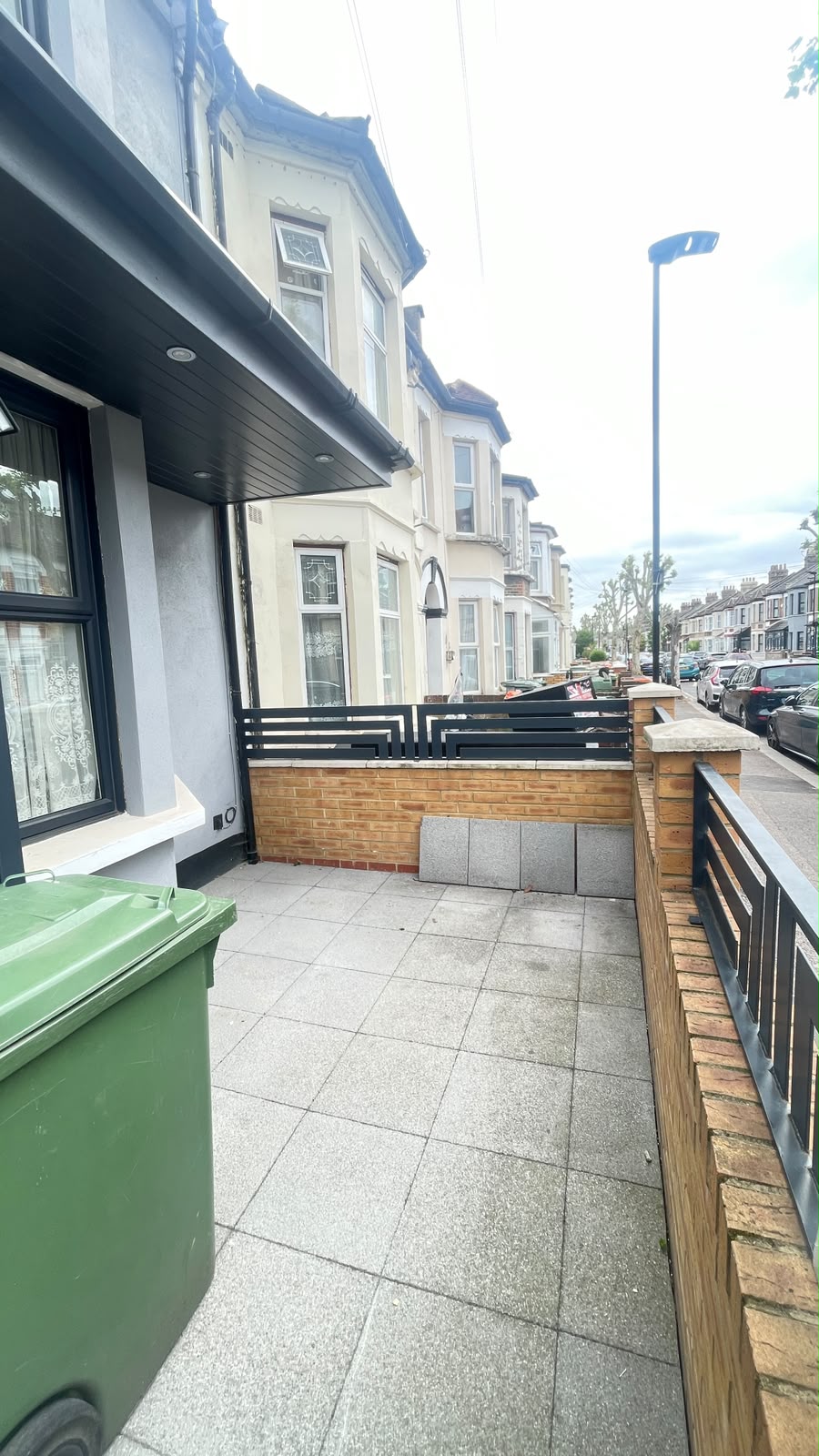 Swept and cleared patio after garden waste removal