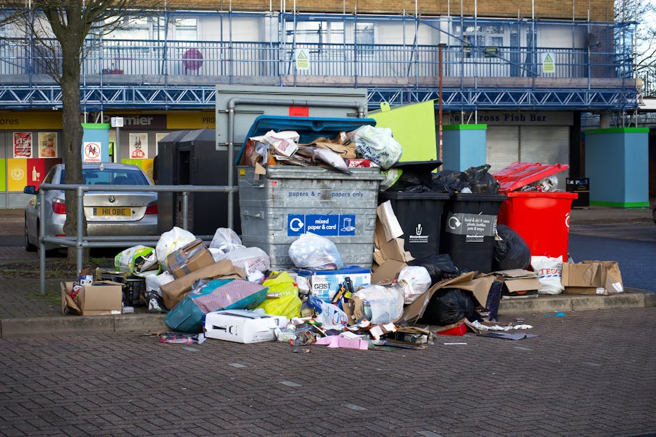 Commercial bins overflowing with bulky mixed waste