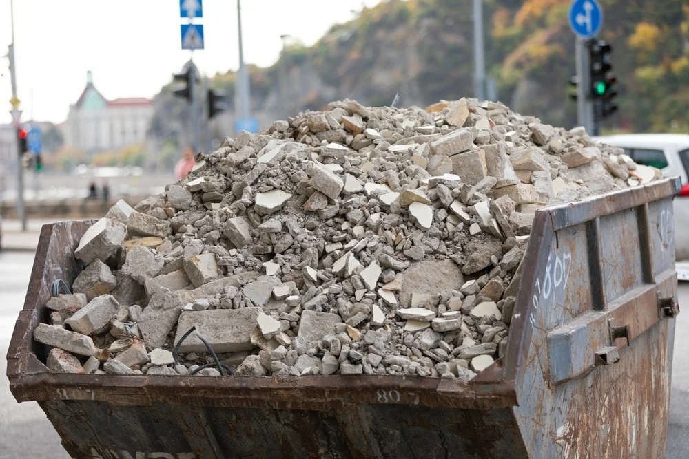 Large pile of crushed concrete and aggregate waste