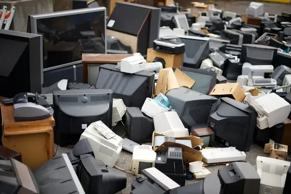 Computer monitors and equipment awaiting collection